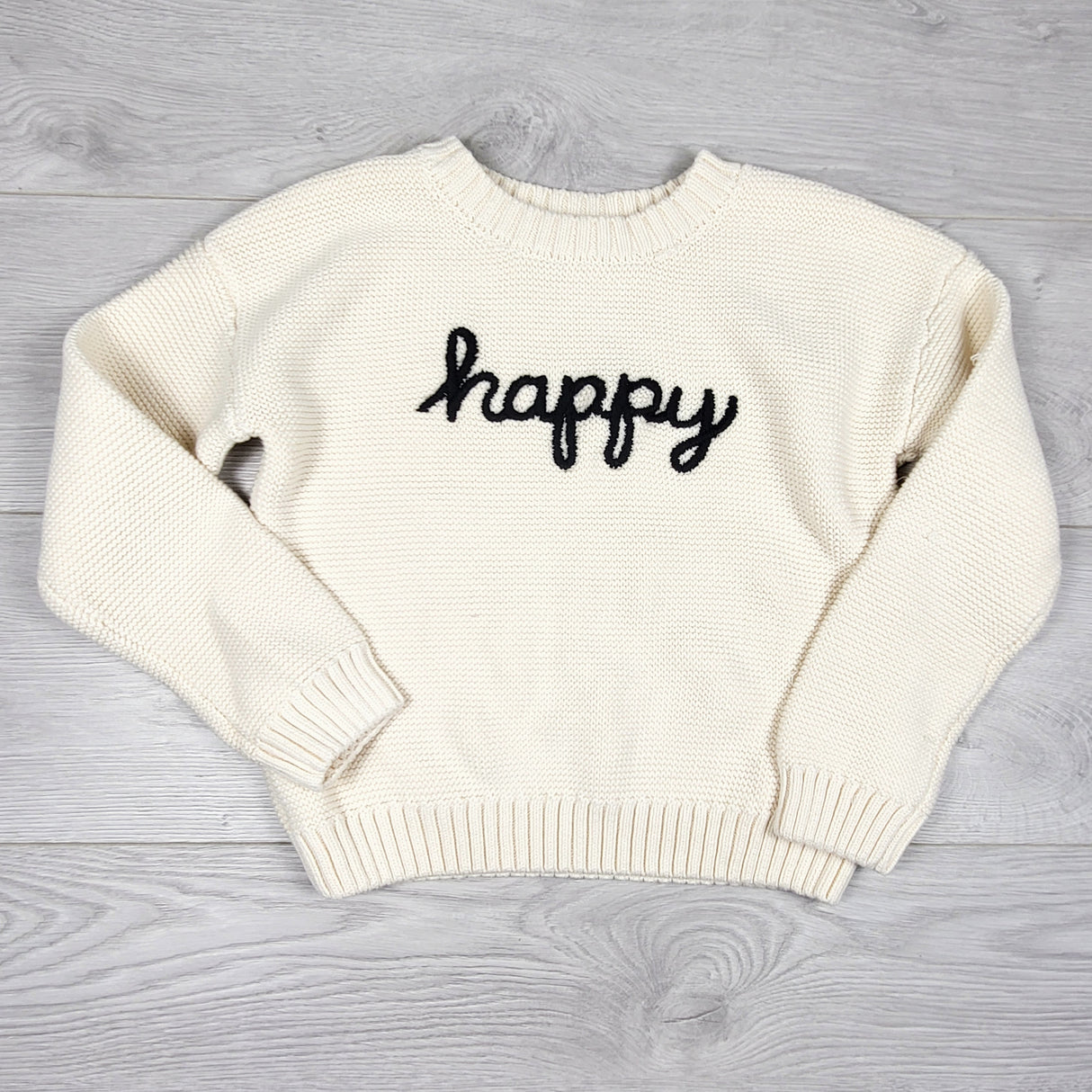 KTBL1 - Joe cream coloured "Happy" sweater. Size 7/8