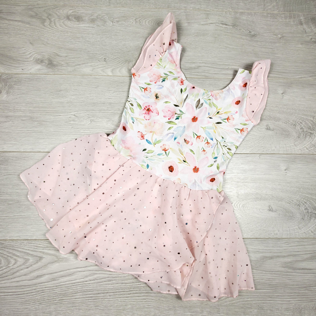 KTBL1 - Arshriner floral print skirted bodysuit. Size 8-10 Years