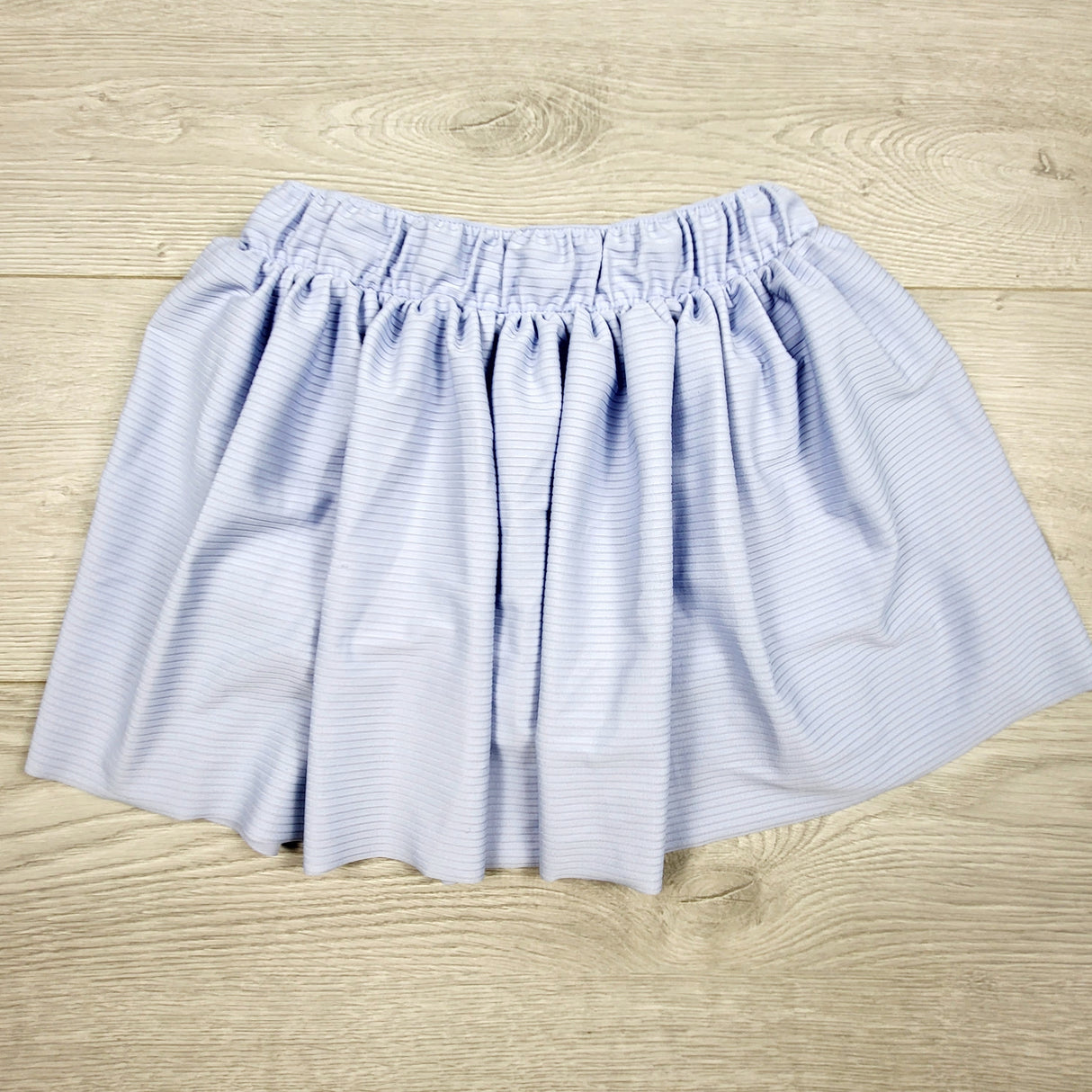KTBL1 - Oshkosh blue striped active skirt with built in shorts. Size 7