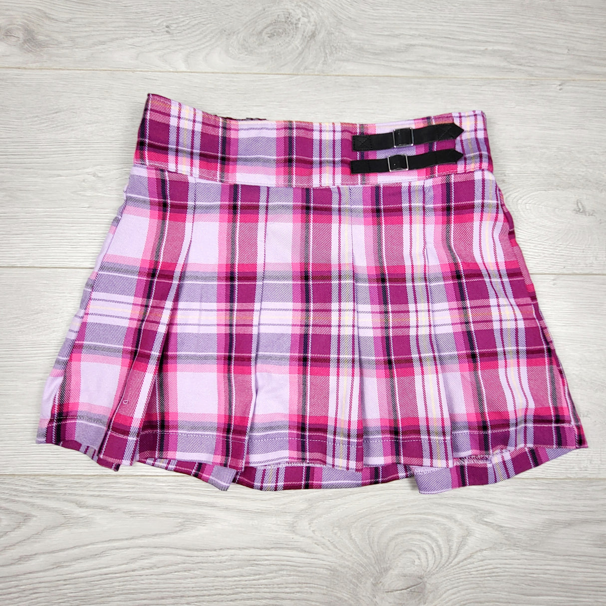 KTBL1 - Justice pink pleated plaid skirt with built in shorts. Size 10