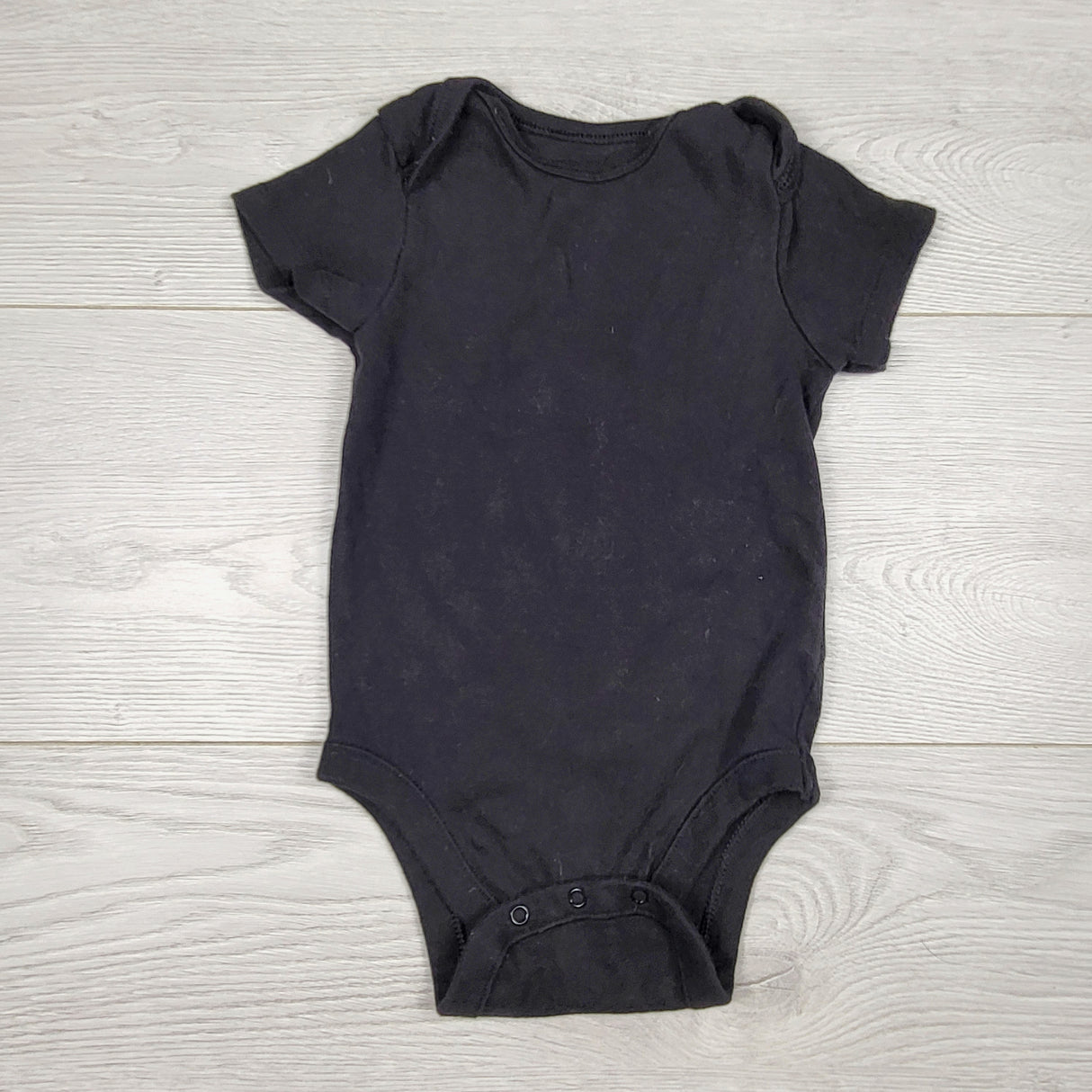 DOKN1 - Old Navy solid black bodysuit. Size 6-12 months