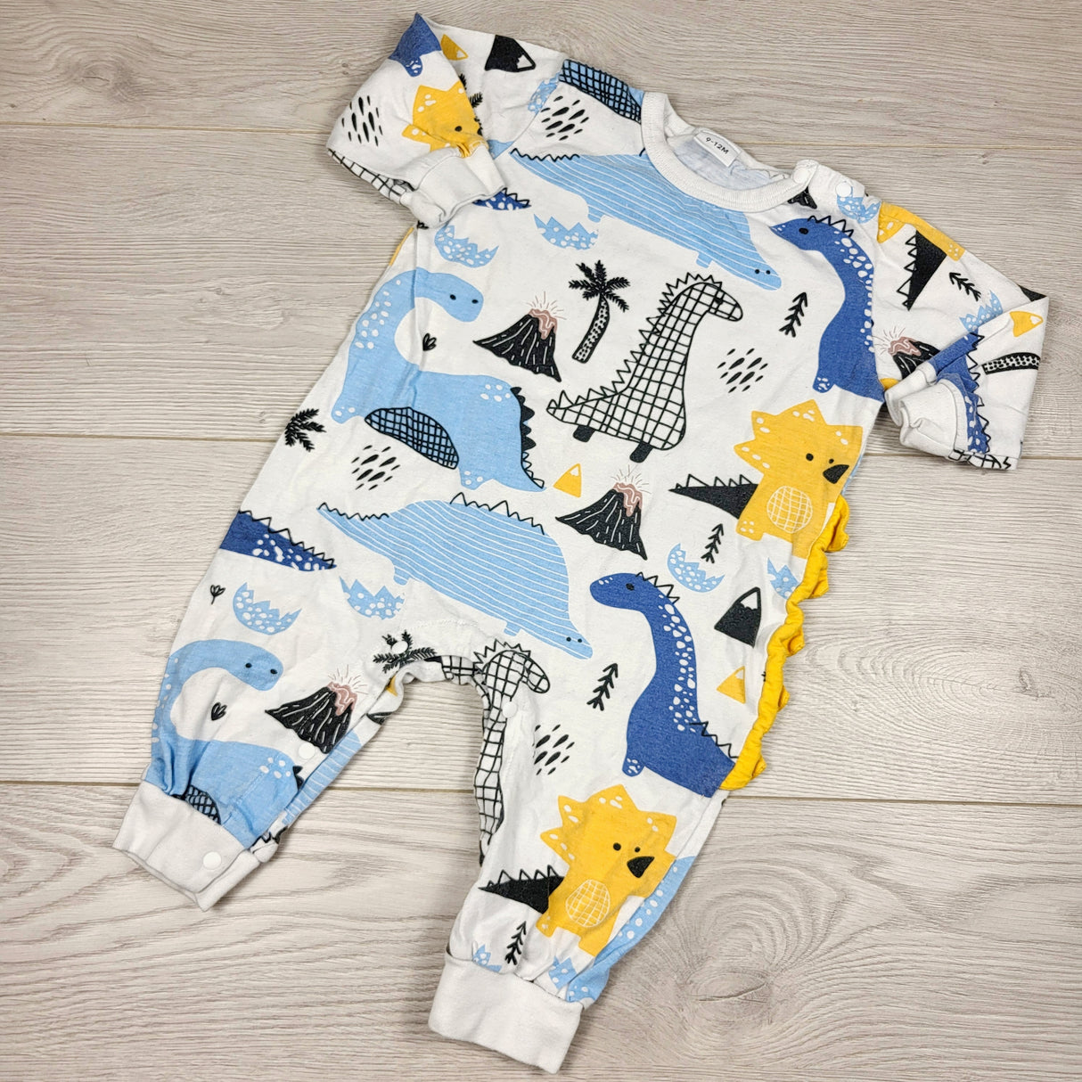 DOKN1 - White dinosaur romper. Size 9-12 months