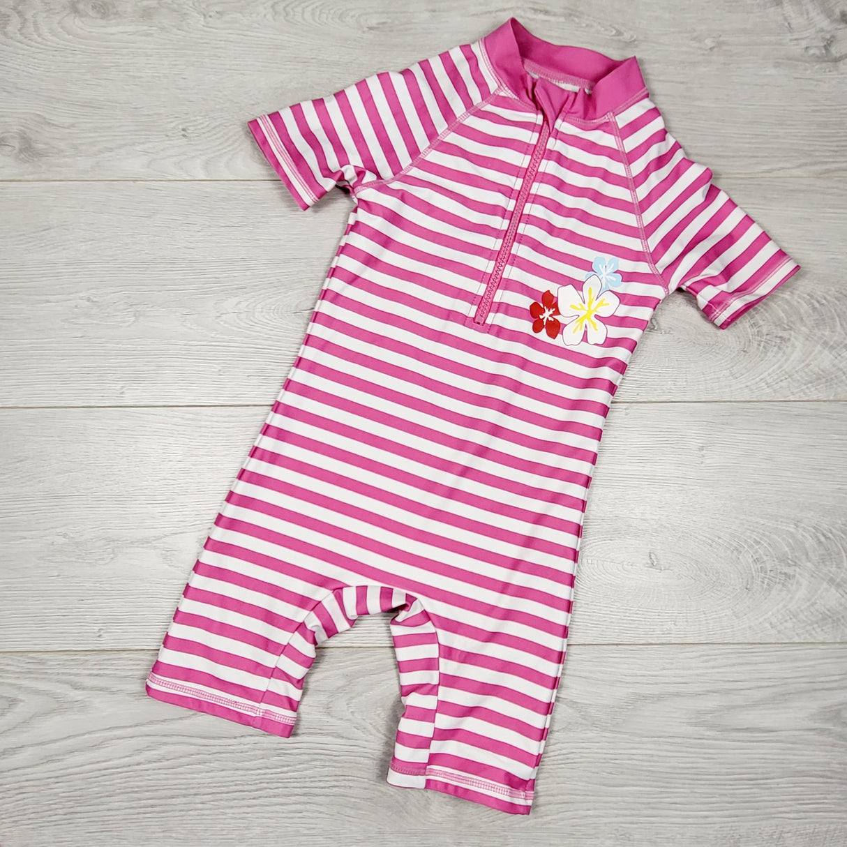 ALWE44 - Bonverano pink striped one piece rash guard. Size 2/3T