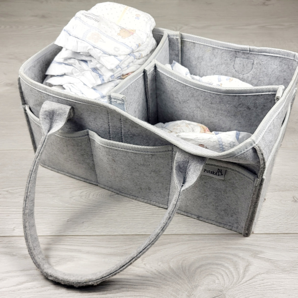CSHR1 - Putska diaper storage basket + diapers (sorry, no shipping)