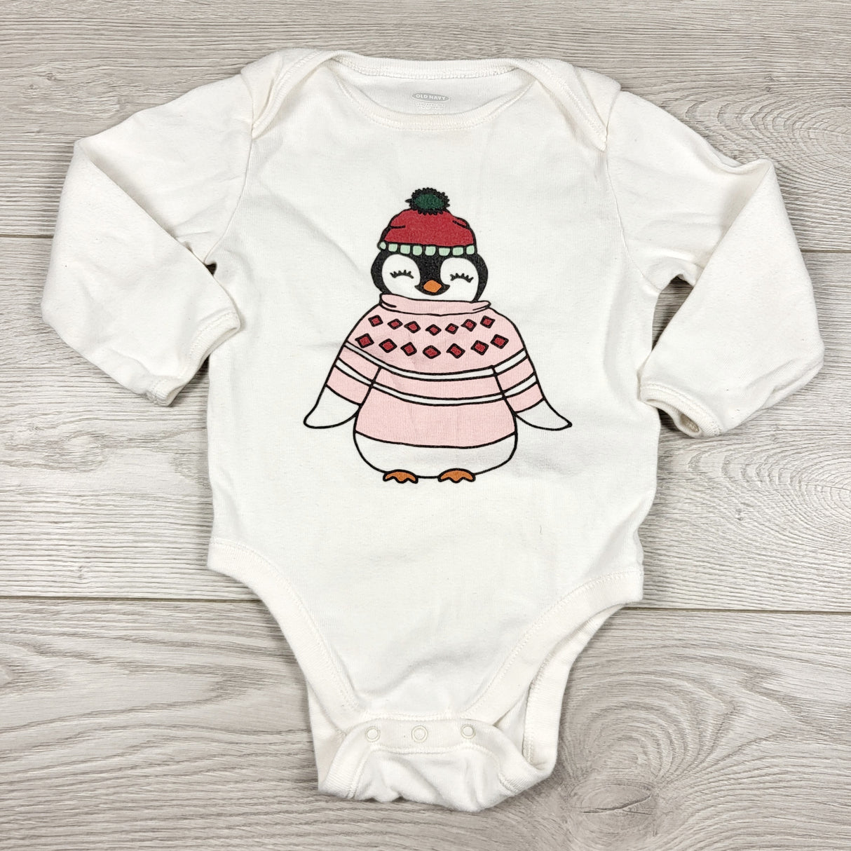 MWLL3 - Old Navy white bodysuit with penguin. Size 6-12 months