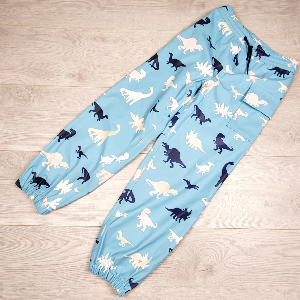 DPAR2 - Hatley blue colour changing dinosaur rain pants. Size 7
