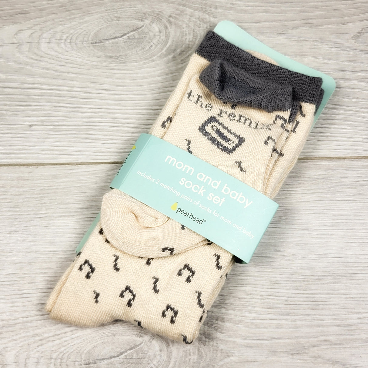 AMST1 - NEW - Pearhead Mom + Baby Sock Set