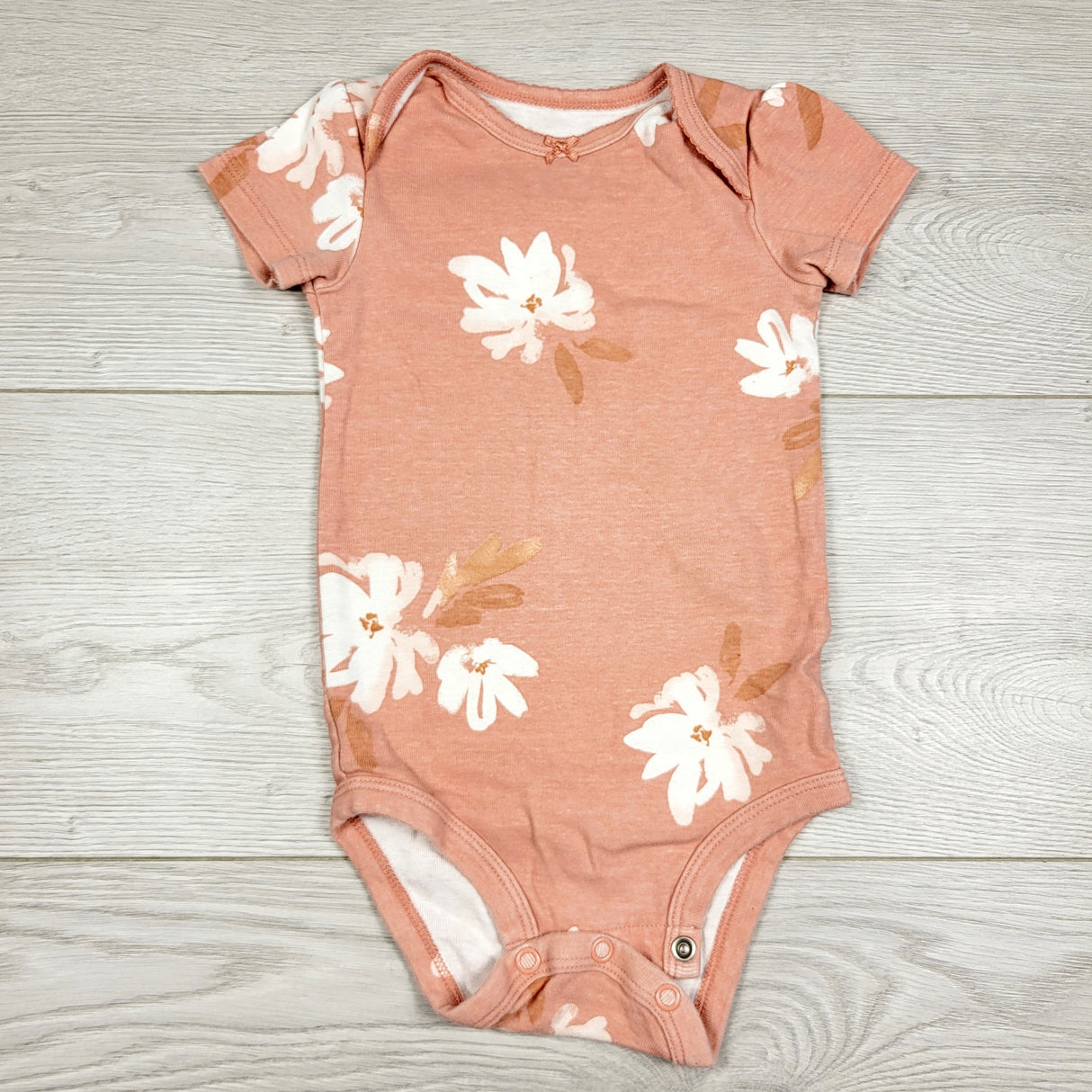 AMST3 - Carters pink bodysuit with flowers. Size 12 months