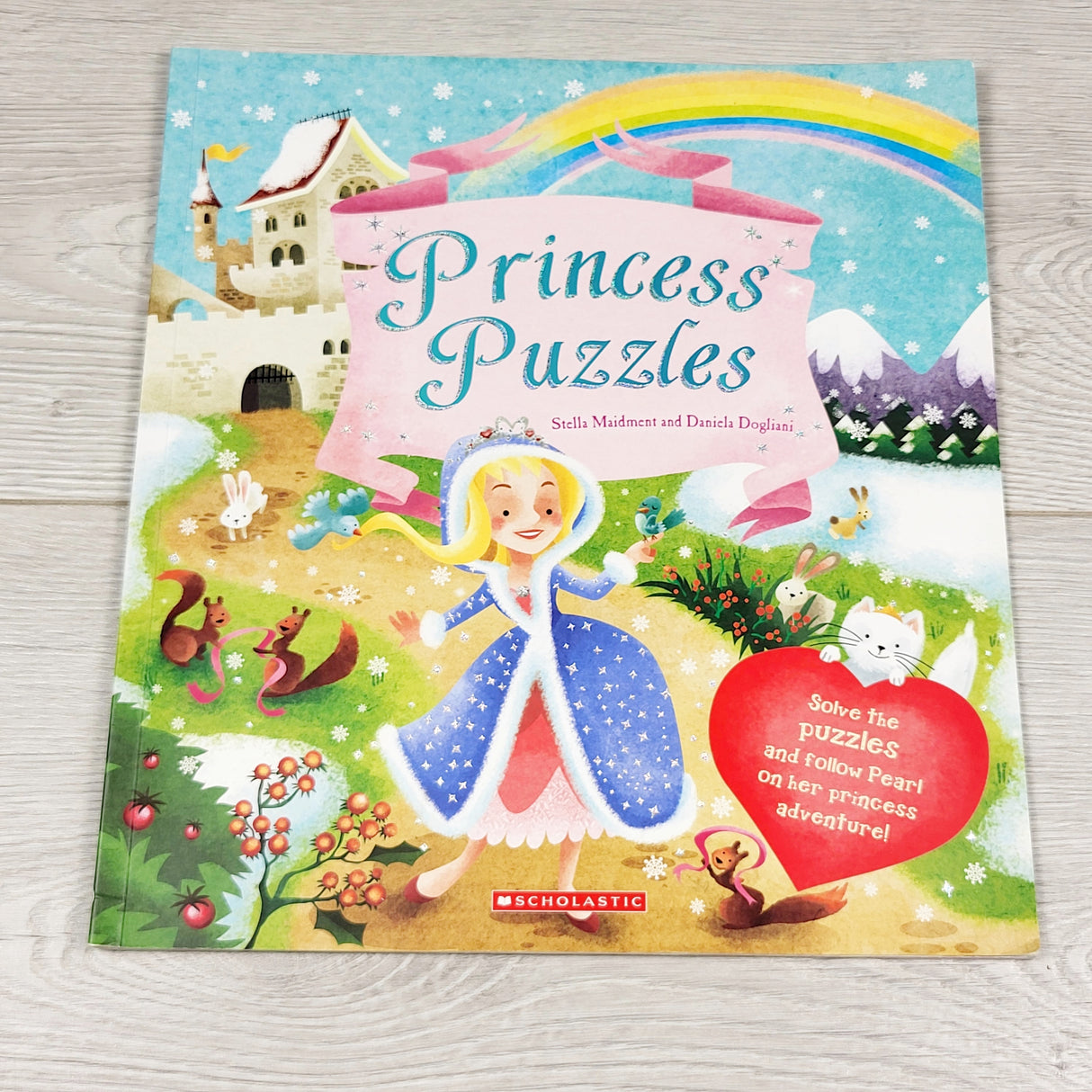 OAG1 - Princess Puzzles. Soft cover book with a puzzle to solve on each page