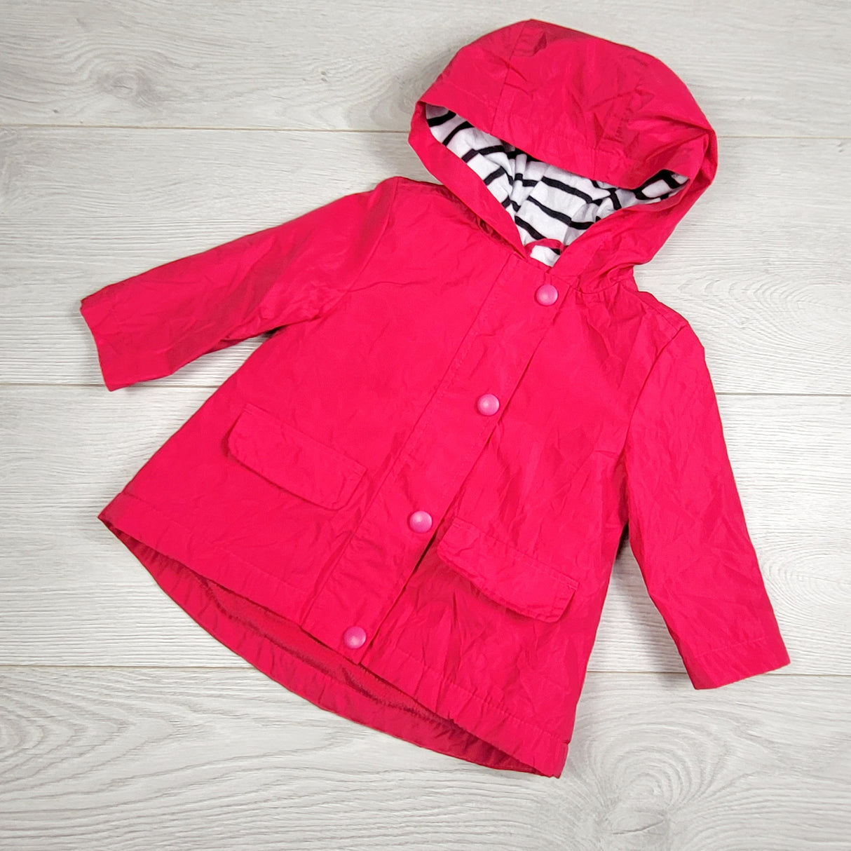 EHEM1 - Joe dark pink jersey lined hooded rain jacket. Size 3-6 months