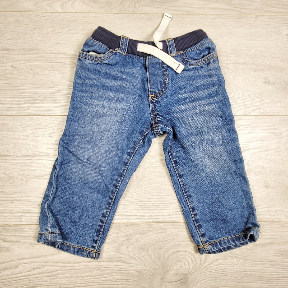 EHEM1 - Carters jeans with cotton waistband. Size 12 months