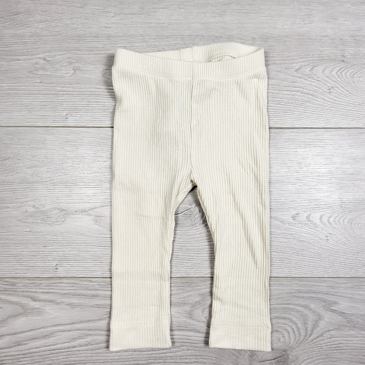 EHEM1 - Old Navy cream coloured ribbed leggings. Size 6-12 months
