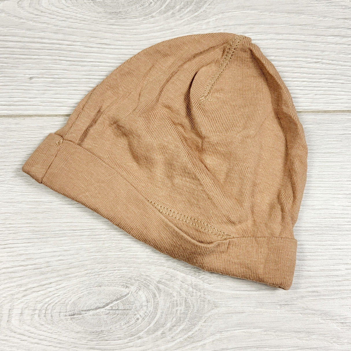 EHEM1 - H and M tan organic cotton hat. Size 2-4 months