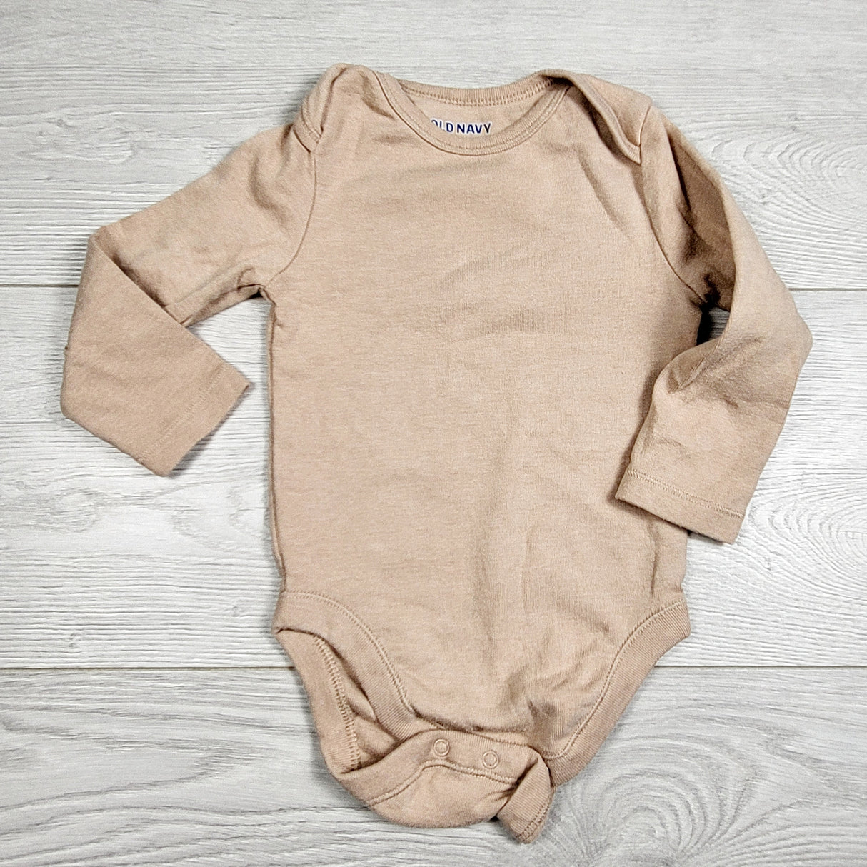 EHEM1 - Old Navy sand coloured bodysuit. Size 6-12 months