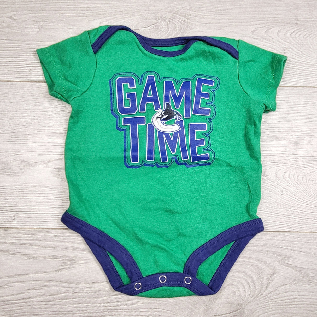 EHEM1 - Navy and green Vancouver Canucks bodysuit. Size 12 months