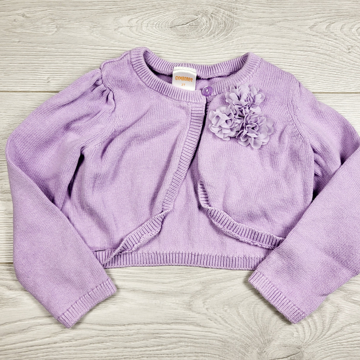 RXC1 - Gymboree purple sweater with fabric flower. Size 2T