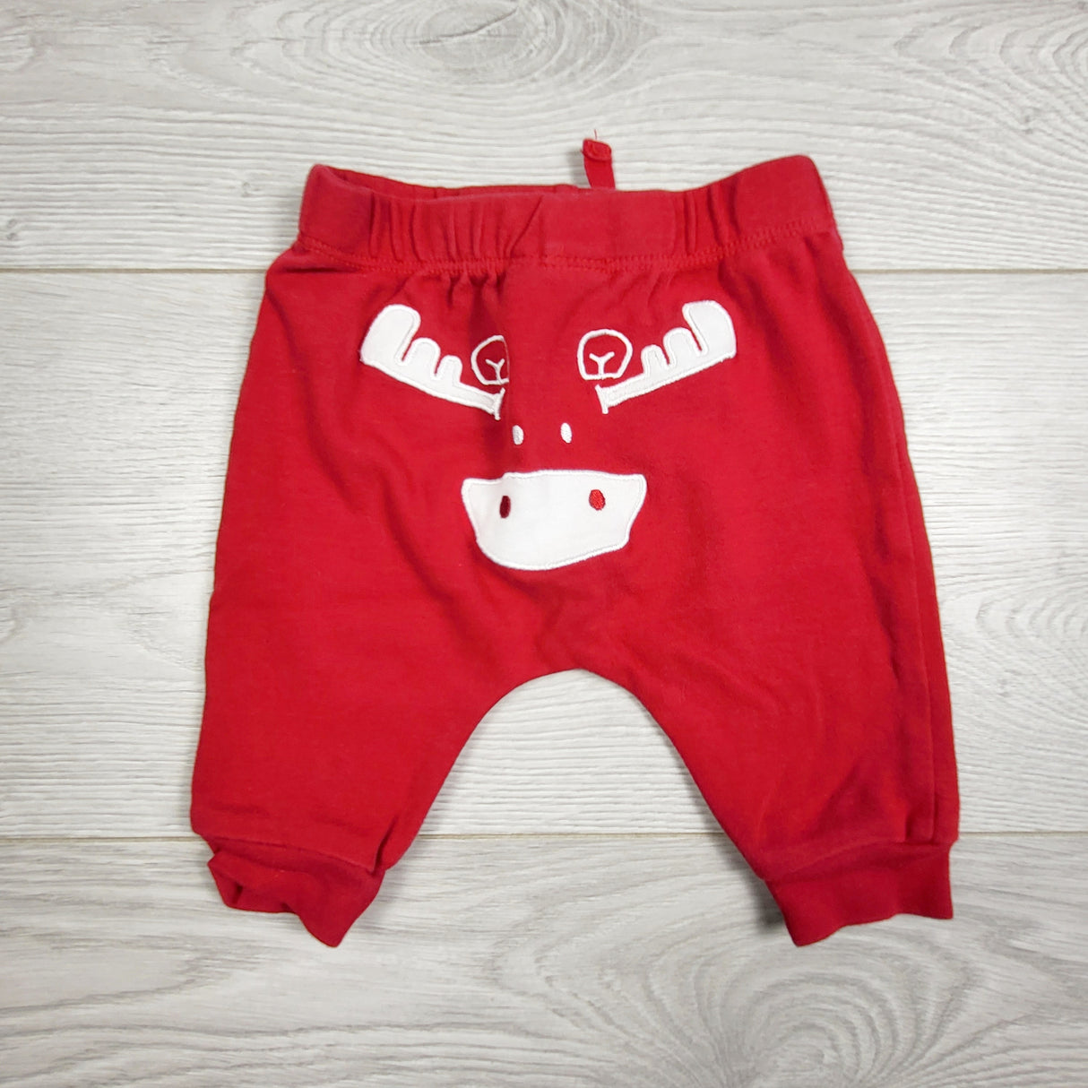 RXC1 - Red cotton pants with moose on bum. Size 0-3 months