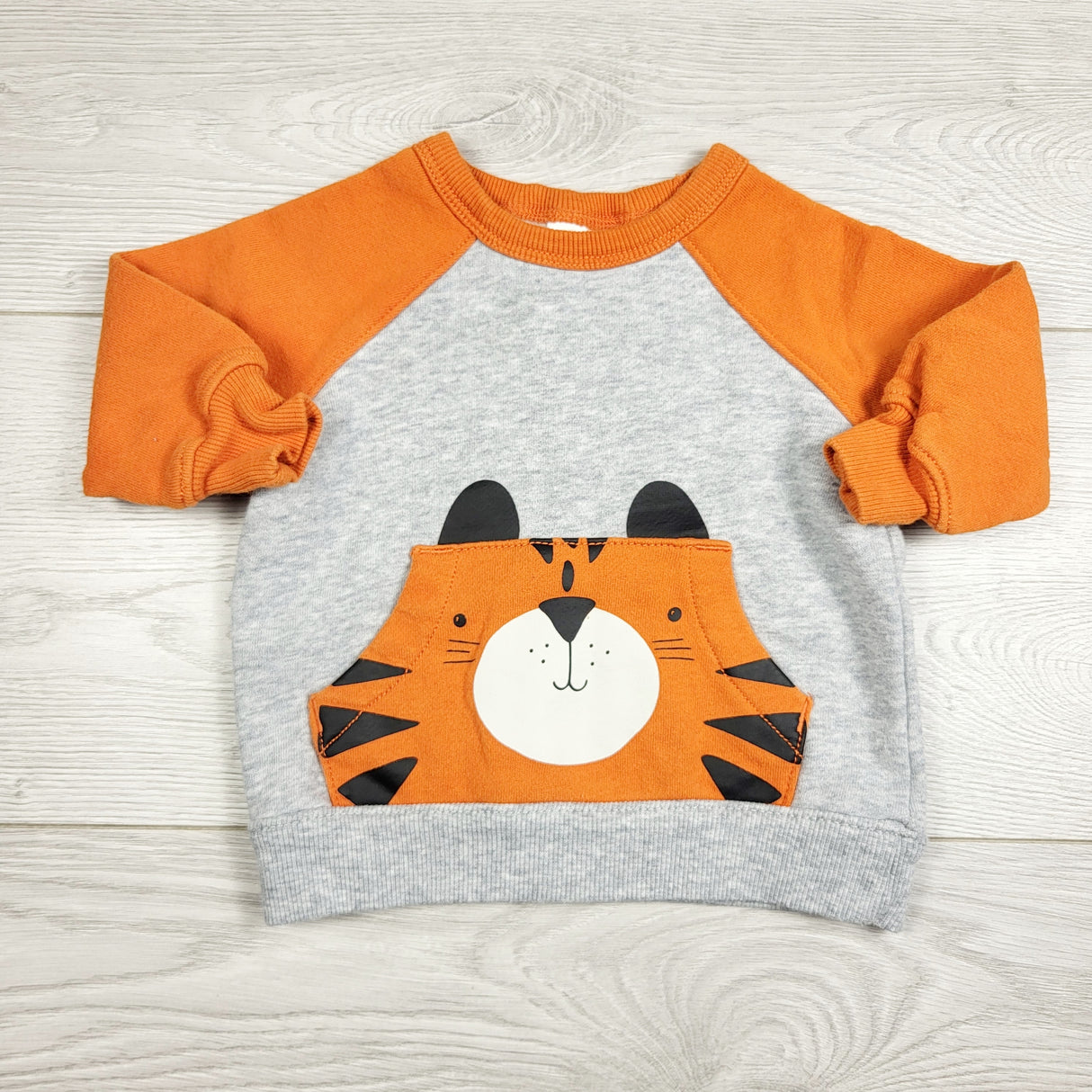 RXC1 - Carters fleecy lined tiger sweatshirt. Size 3 months