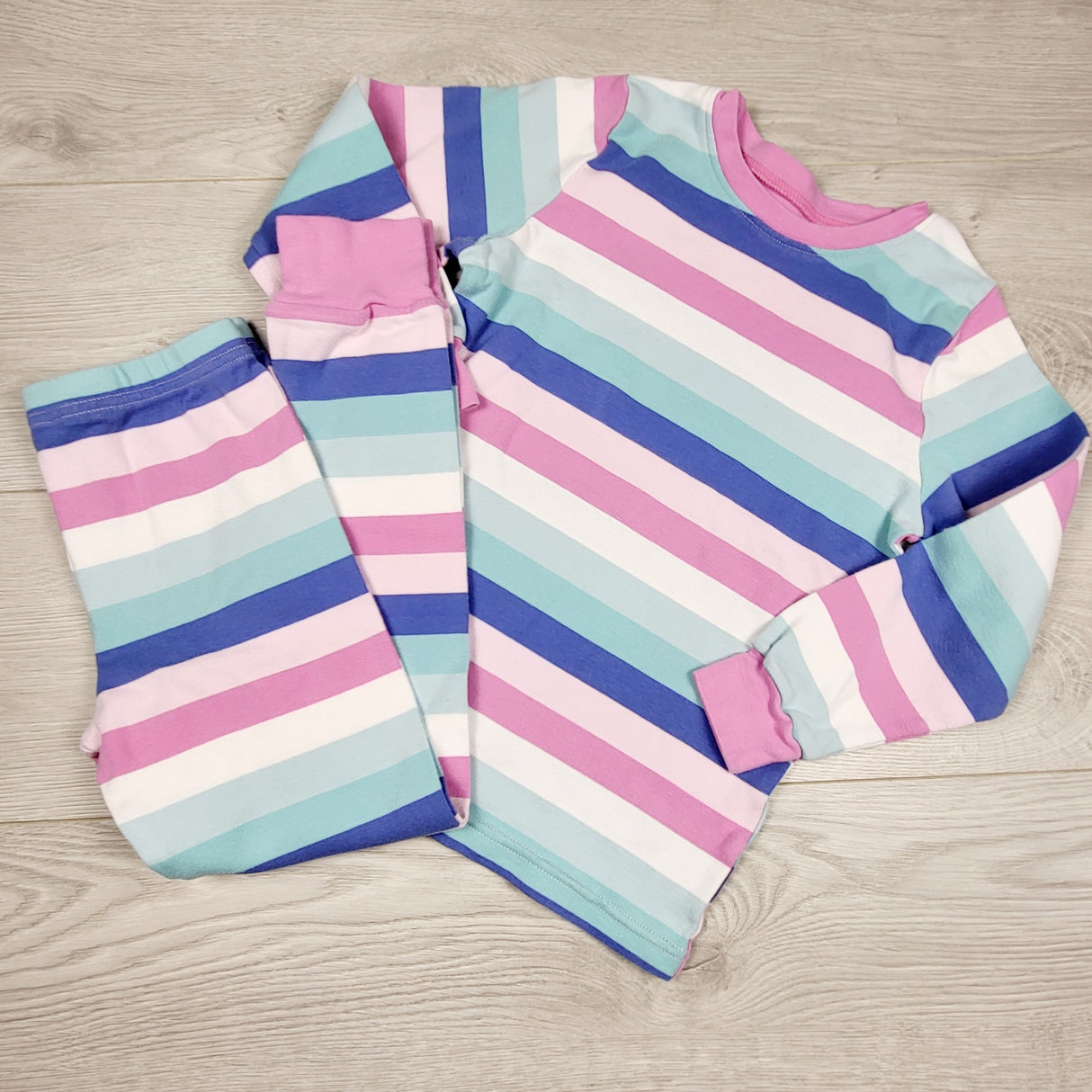 DAMO1 - Kirkland striped 2pc PJs. Size 7