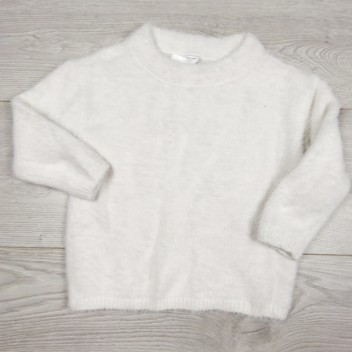 AMST4 - Carters white super soft fuzzy sweater. Size 18 months