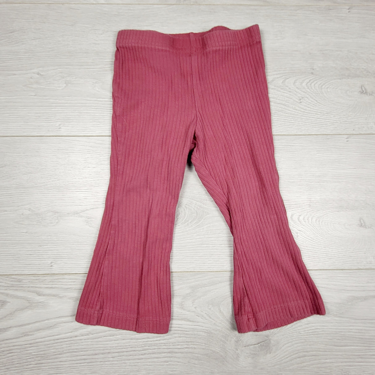 AMST4 - Carters pink ribbed flare leggings. Size 18 months