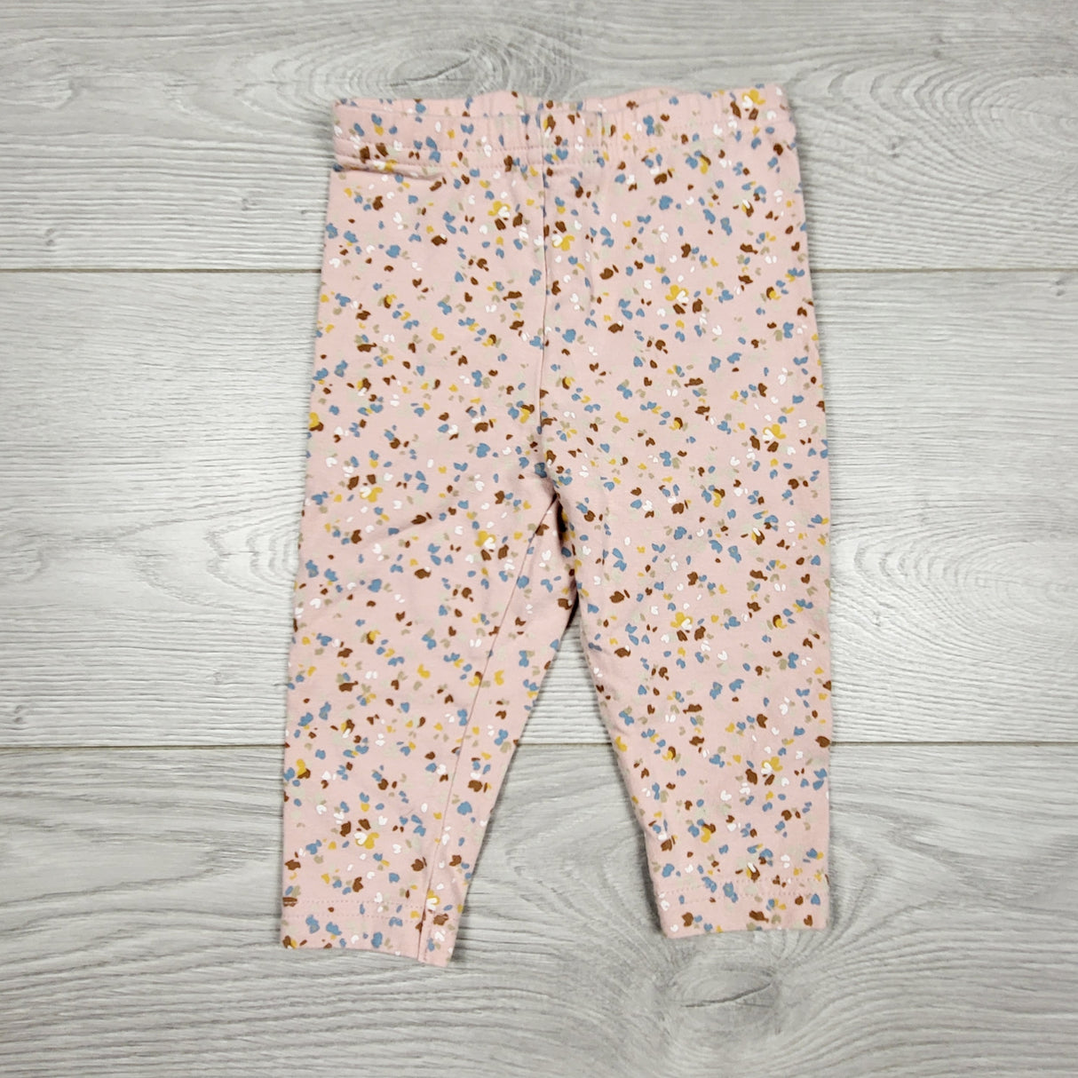 AMST4 - Carters pale pink splatter pattern leggings. Size 9 months