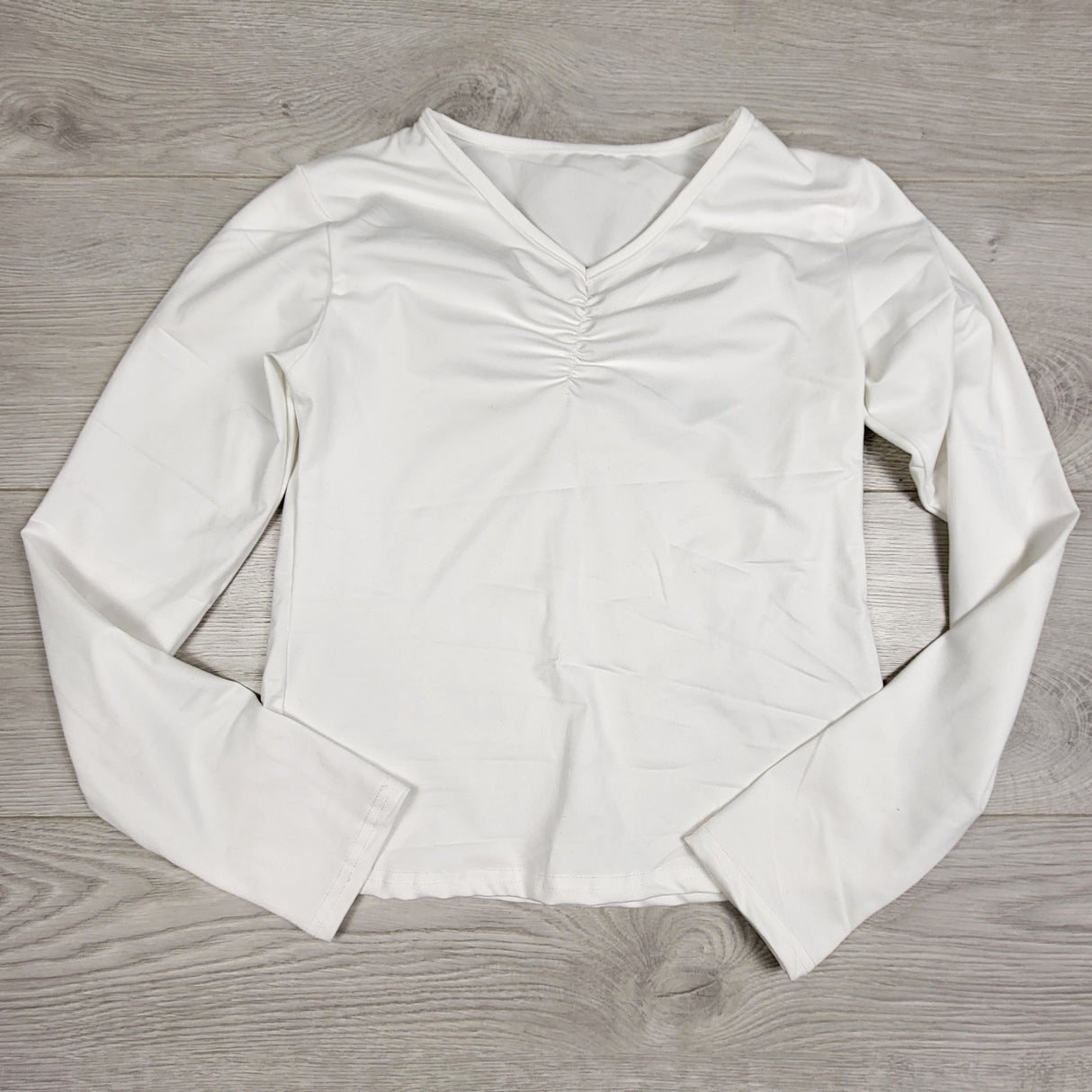 DLJ2 - Joocy Babi Kids white long sleeved top. Size 9