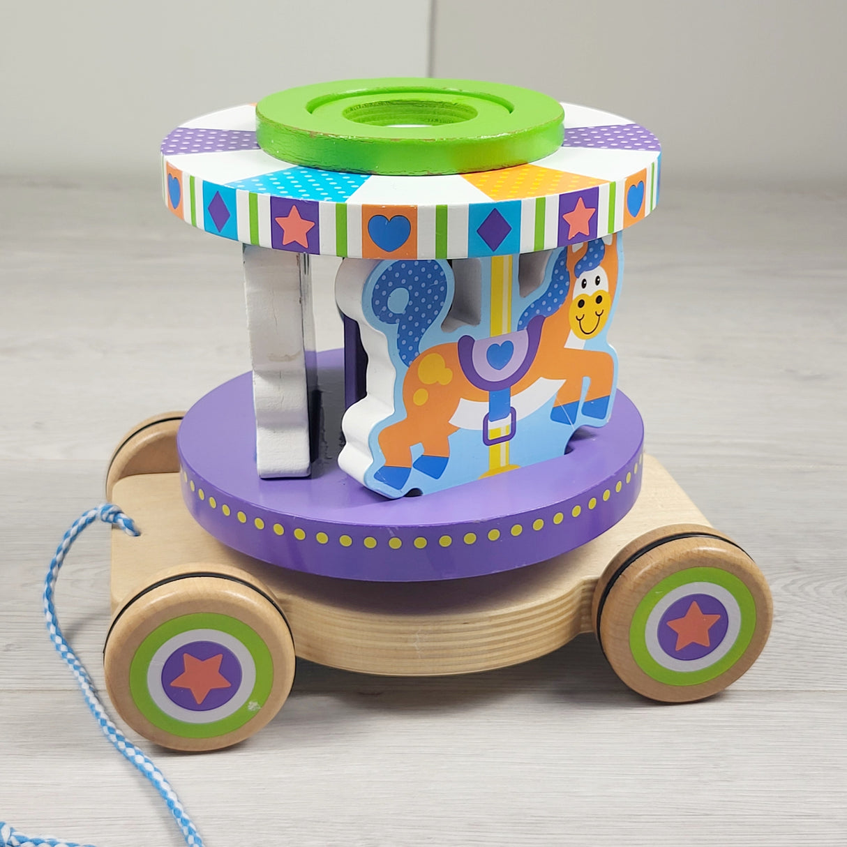 TEMA2 - Melissa & Doug First Play Carousel Pull Toy (sorry, no shipping)