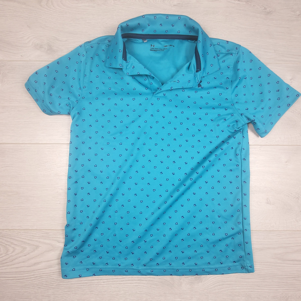 TCLW1 - Under Armour turquoise patterned loose fit active polo. Youth size medium
