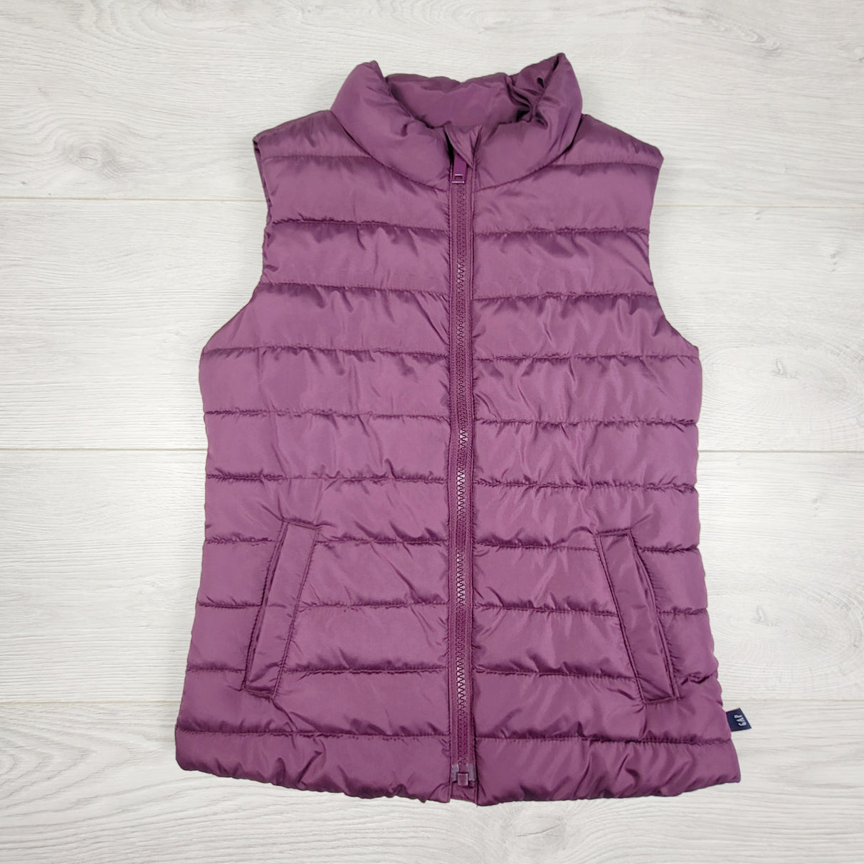TCLW1 - Gap purple puffer vest. Size small