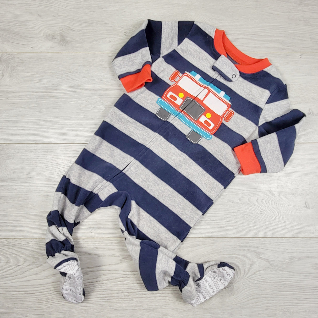 KAMG2 - Carters navy and grey striped zippered fleece fire truck sleeper. Size 12 months