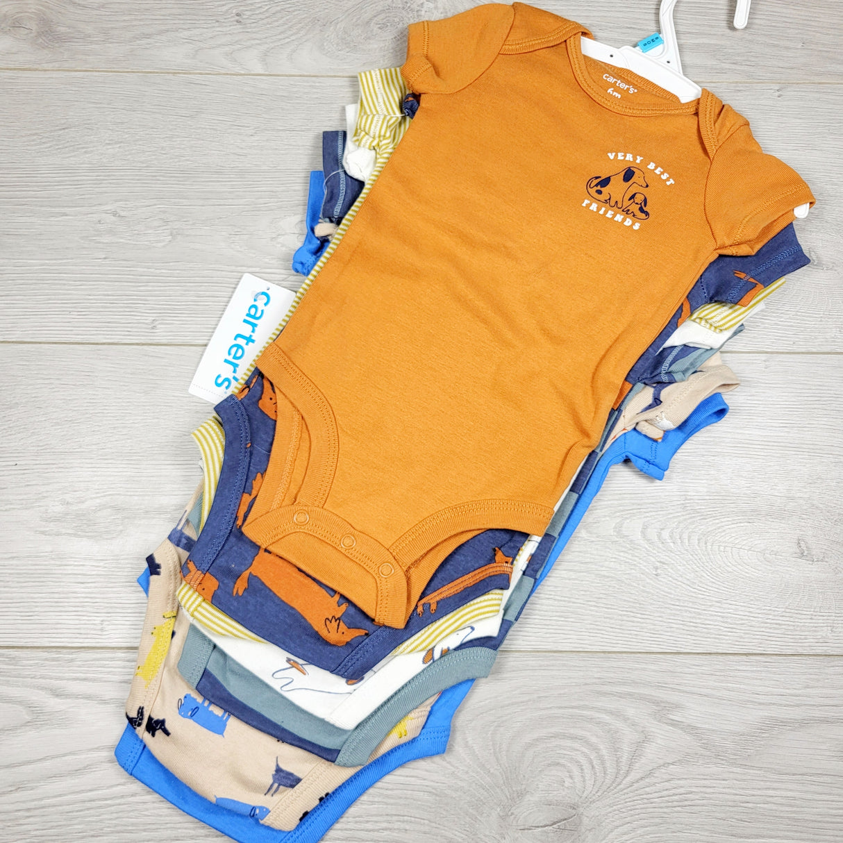 RXC2 - NEW - Carters 7pc bodysuit set. Size 6 months