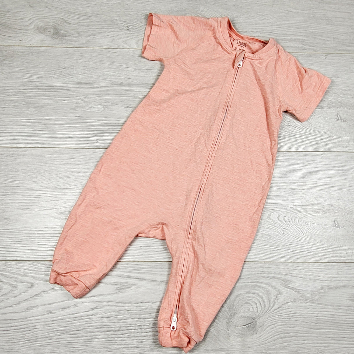 MWLL5 - Nest Designs coral zip up bamboo sleeper. Size 6-12 months
