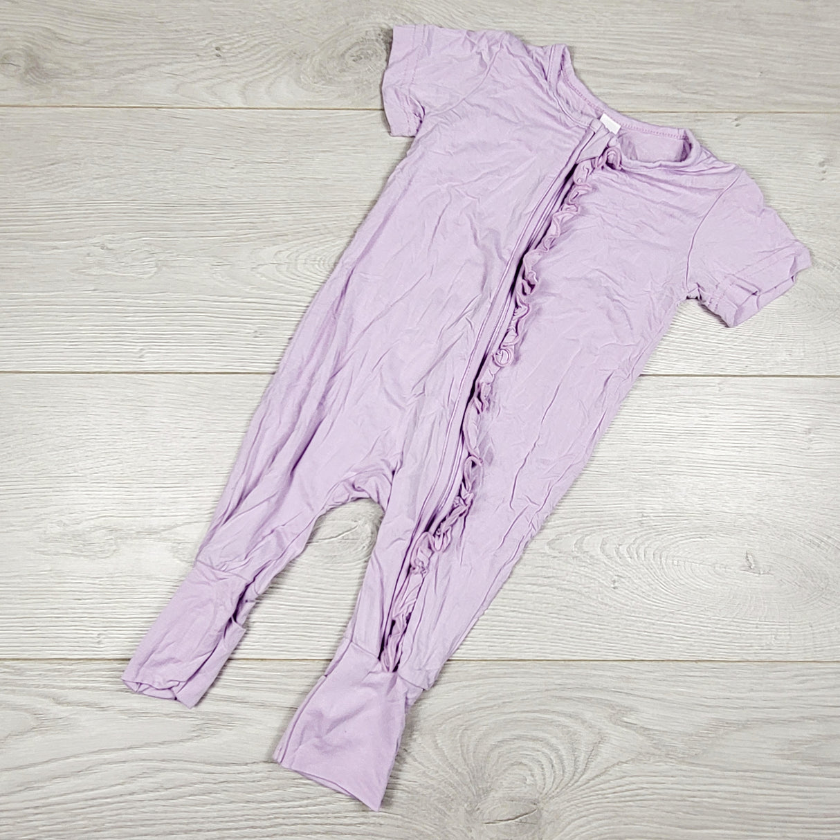 MWLL5 - Unbranded purple bamboo romper with ruffle. Size 3-6 months