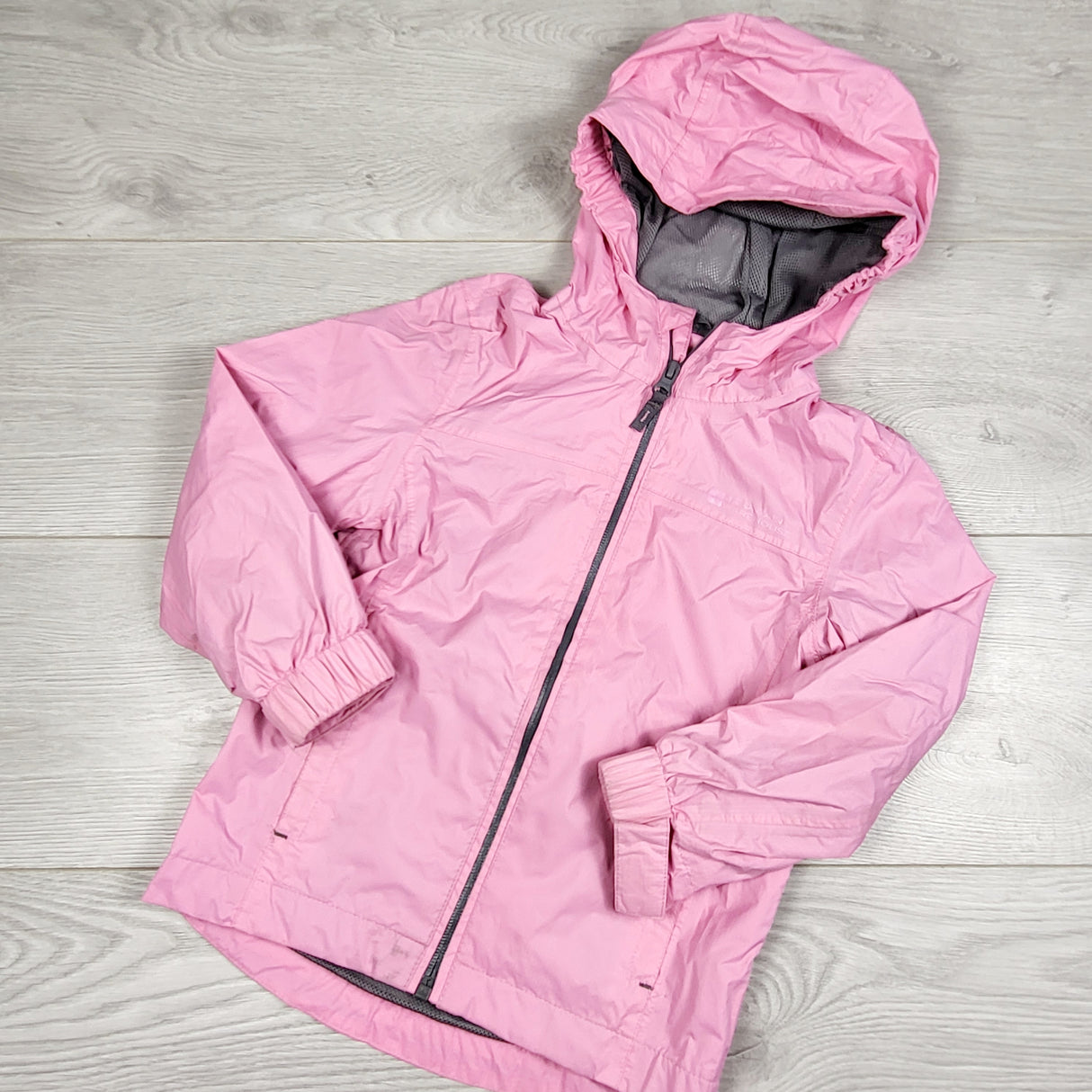 VIBU1 - Mountain Warehouse pink hooded rain coat. Size 3/4T