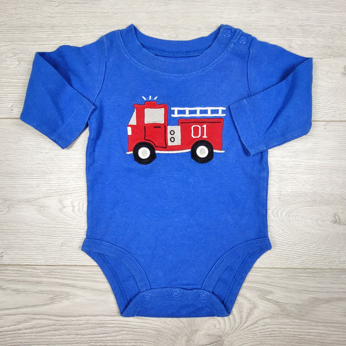 KAMG3 - Carters blue fire truck bodysuit. Size 6 months