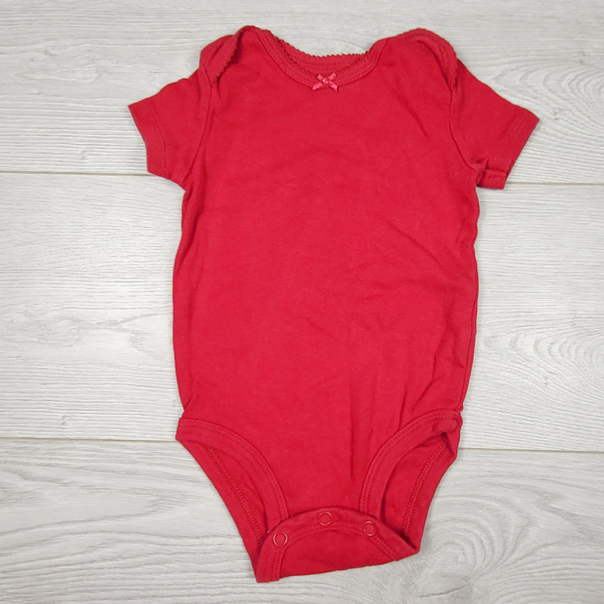 VIBU33 - Carters red short sleeved bodysuit. Size 6 months
