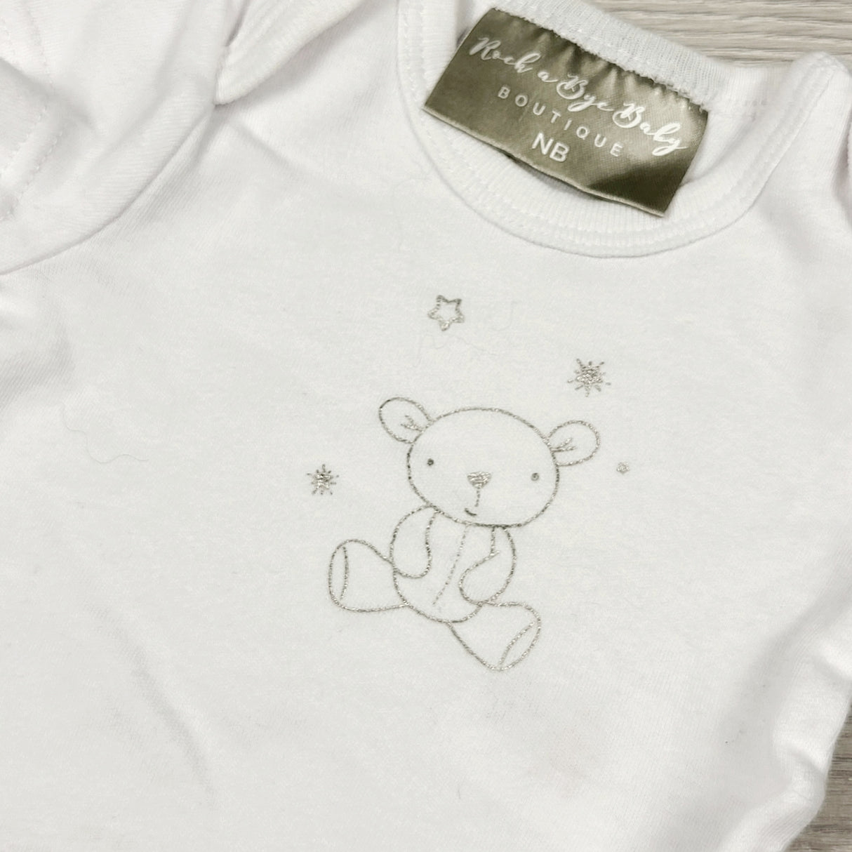 VIBU33 - Rock a Bye Baby white bodysuit with bear. Newborn size