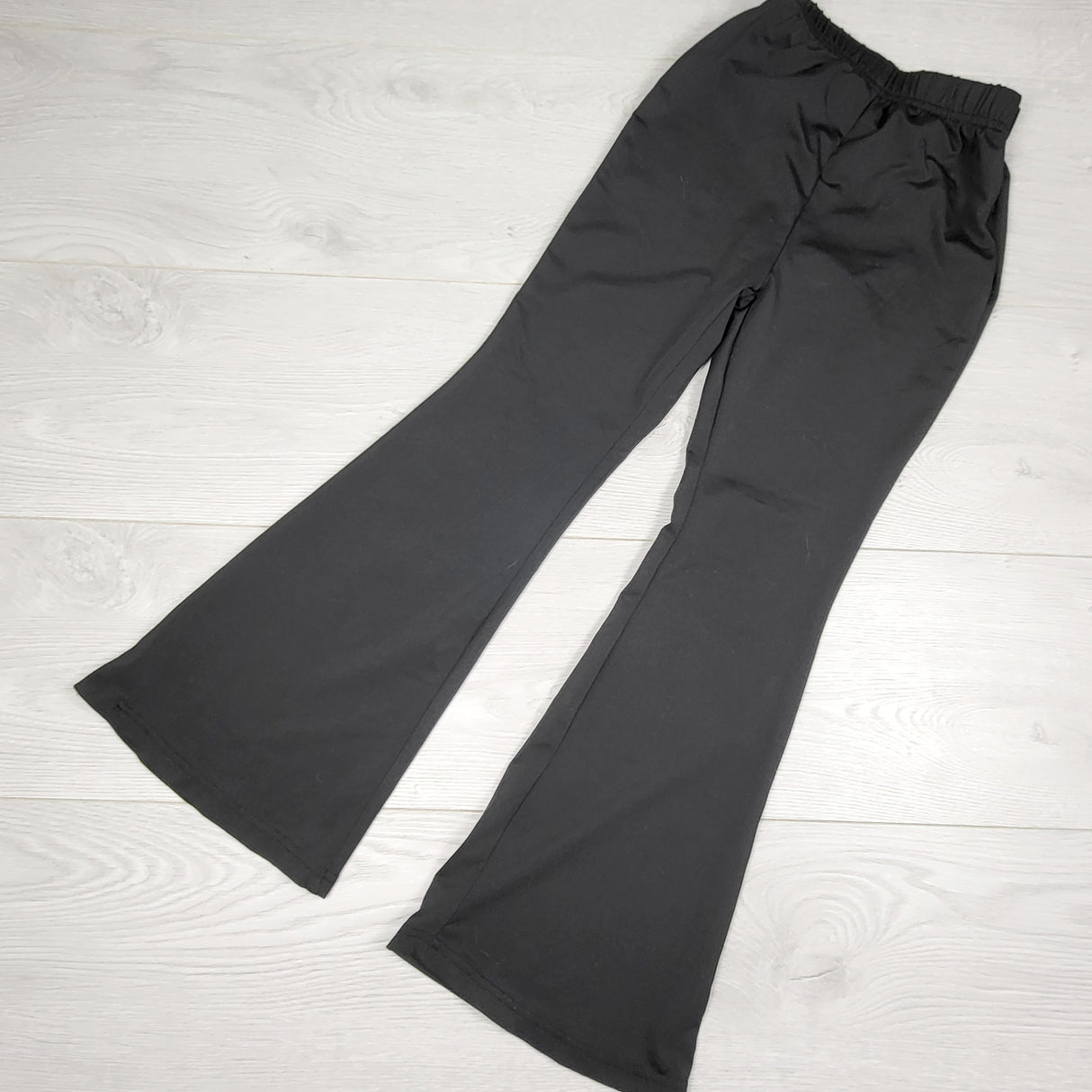 TBRG1 - Black flare leg active leggings. Size 7/8