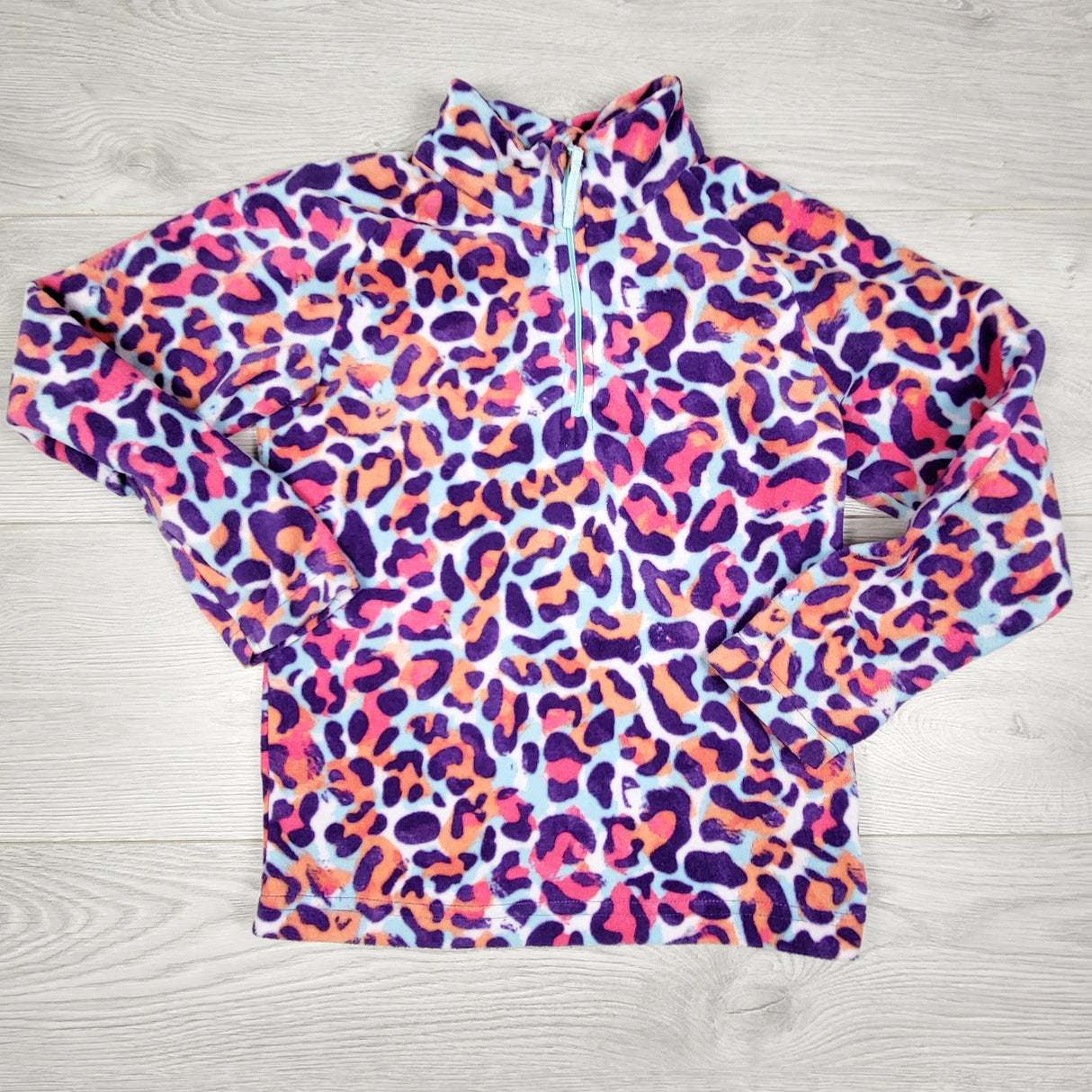 TBRG1 - Mountain Warehouse leopard print half zip fleece coat. Size 7/8