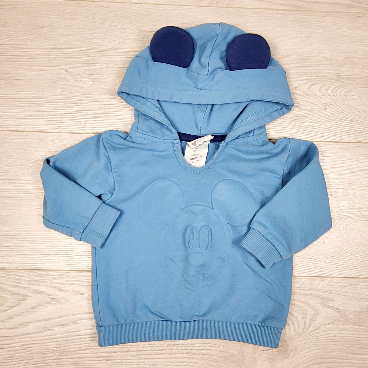 SKOT2 - Disney Baby blue hooded top with embossed Mickey Mouse. Size 12 months