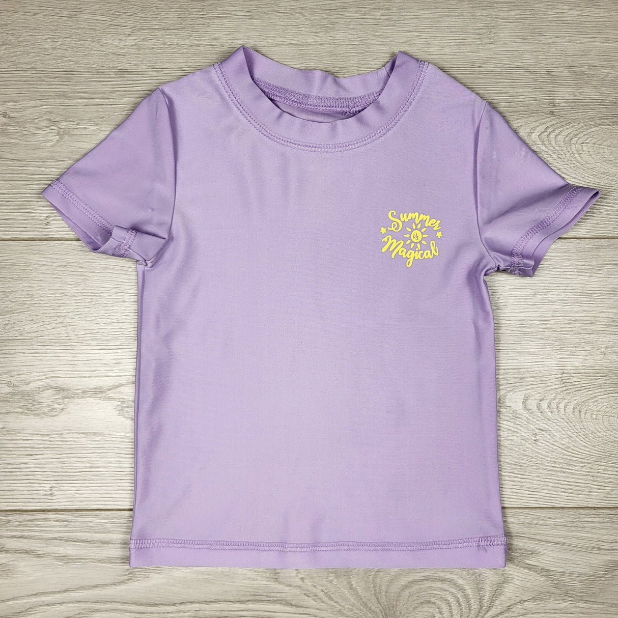 KCHV1 - George purple rash guard. Size 2T