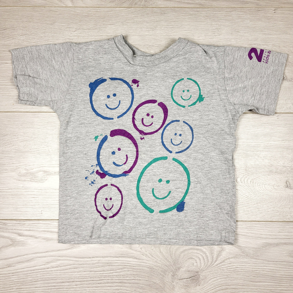 KCHV1 - Kids and Company grey smiley face t-shirt. Size 2/3T