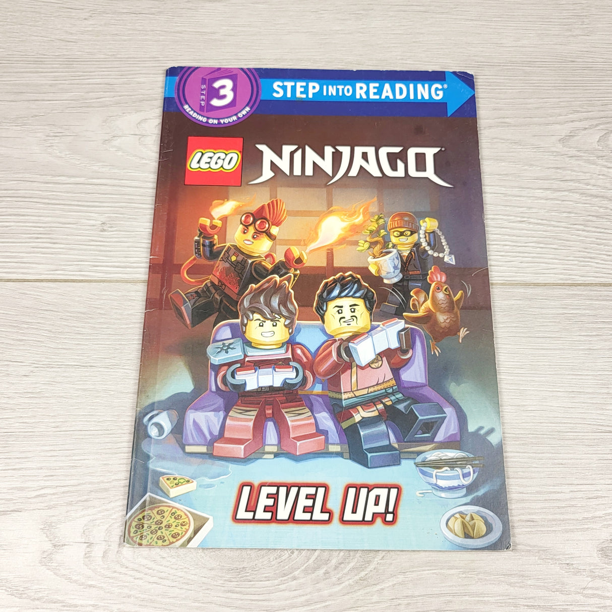 SRIS1 - LEGO Ninjago: Level Up! Soft cover early reader book