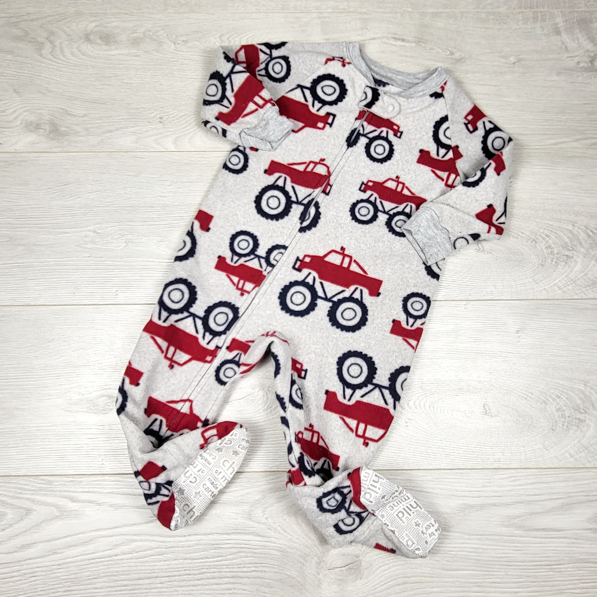 ARDT1 - Child of Mine grey fleece monster truck sleeper. Size 12 months
