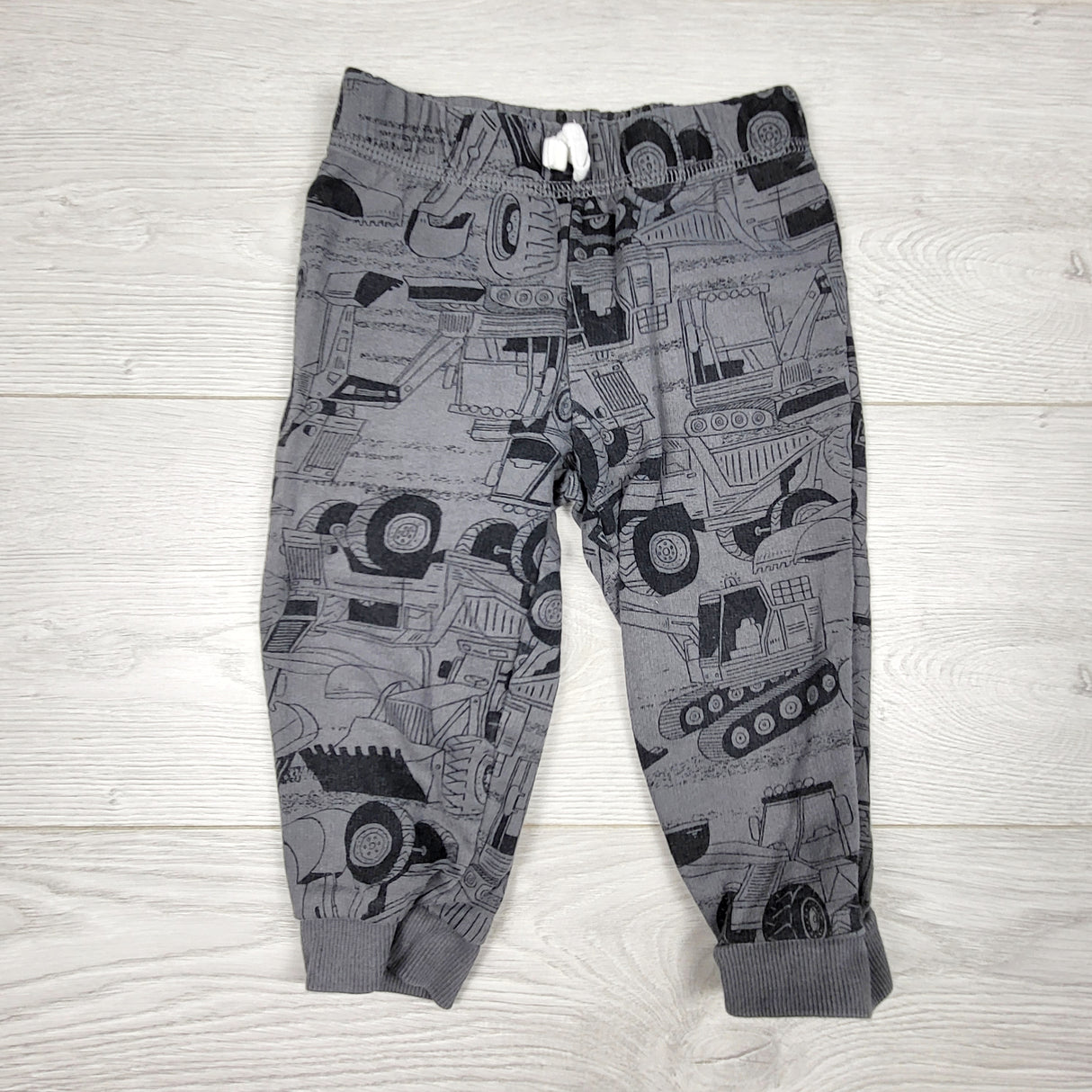 KRML1 - Carters grey cotton joggers with construction theme. Size 18 months