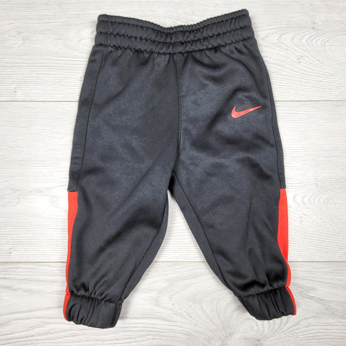 KRML1 - Nike black and red Dri-fit joggers. Size 6 months