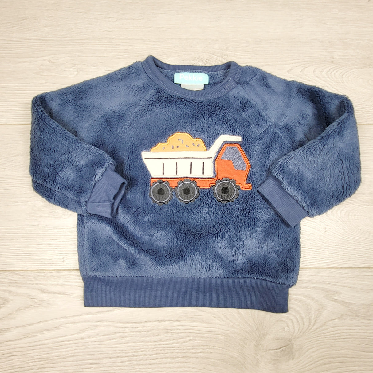 KRML1 - Pekkle blue faux fur sweatshirt with dump truck. Size 12 months