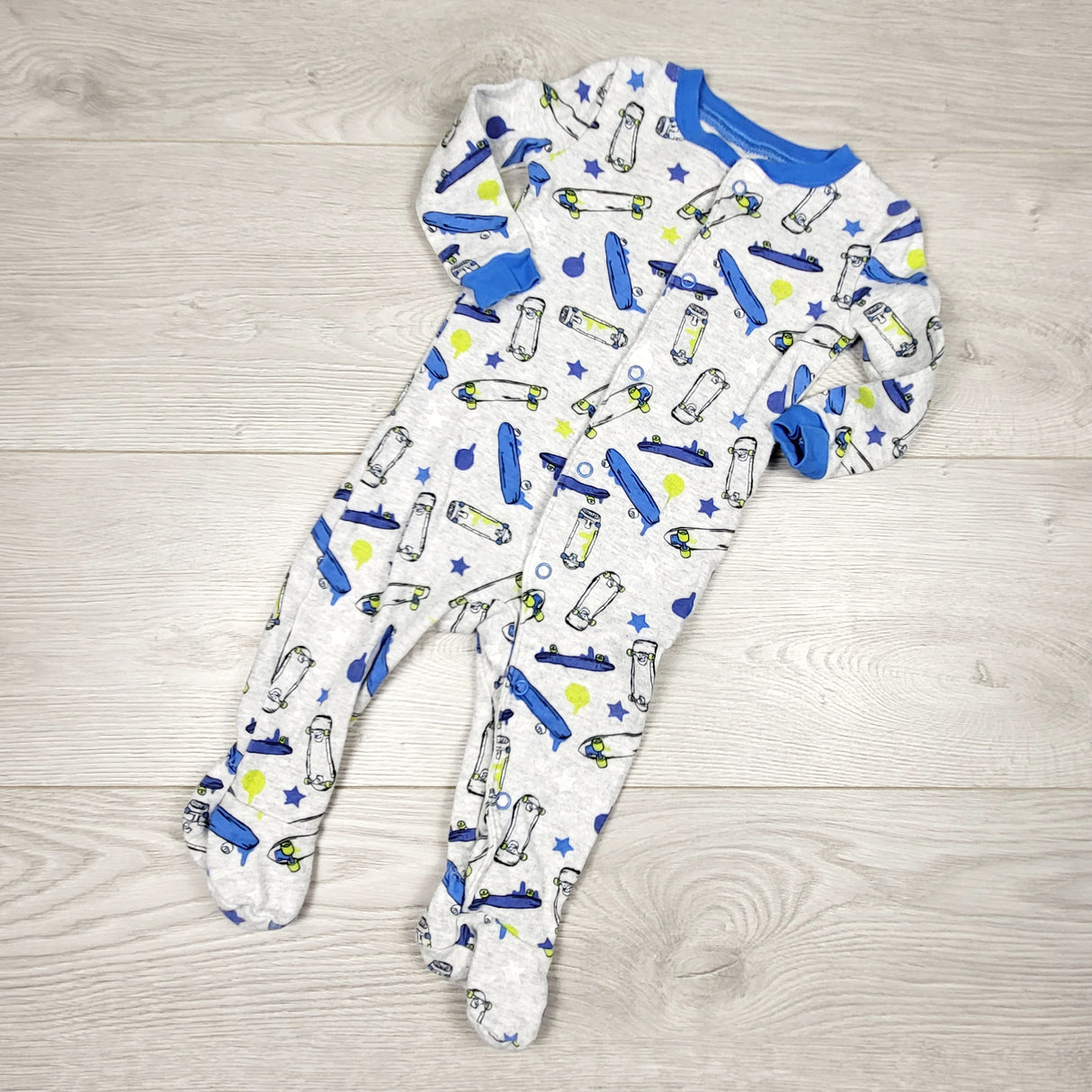 KRML1 - Joe grey cotton sleeper with skateboards. Size 6-12 months