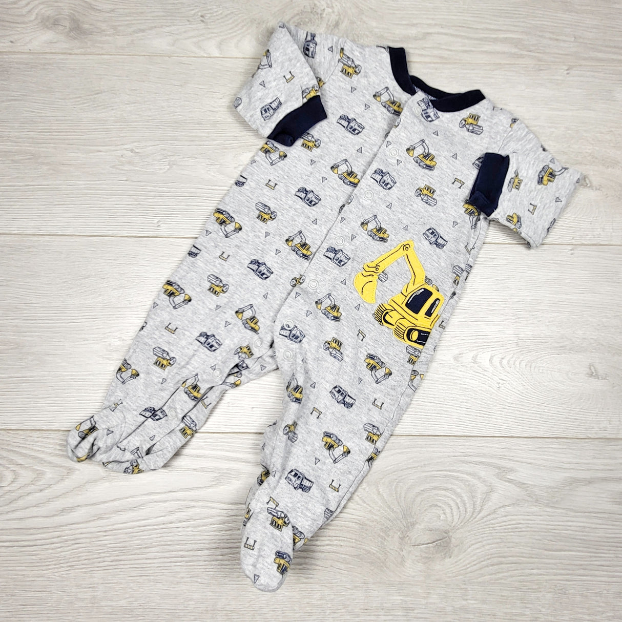 KRML1 - Child of Mine grey cotton sleeper with diggers. Size 3-6 months